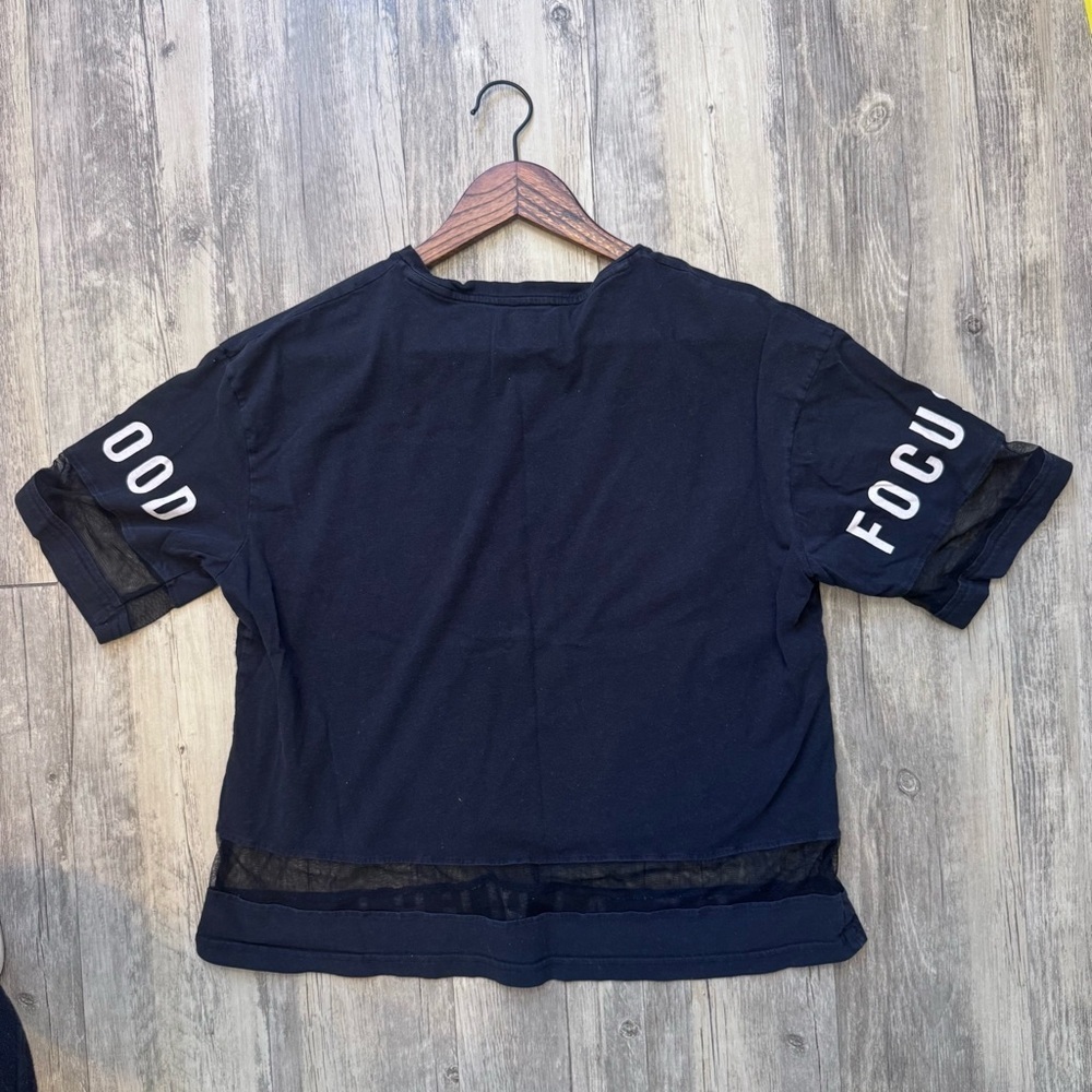 Black Graphic Women's Tee with Mesh Accents - Picture 2 of 10